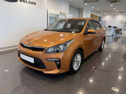 Оранжевый Kia Rio IV